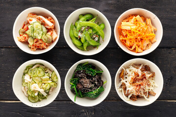 Top view on a variety of different asian topping appetizers
