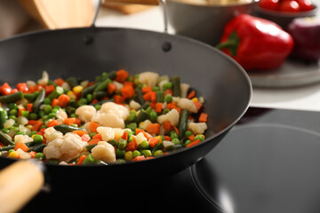 Frying pan with mix of fresh vegetables, closeup