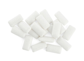 Heap of chewing gum pieces on white background, top view