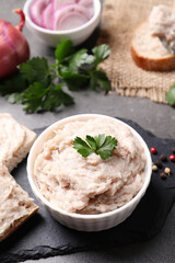 Delicious lard spread in bowl on grey table