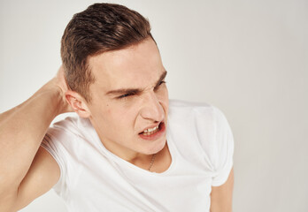 Fototapeta premium Nervous man touches his head stress Model of emotion