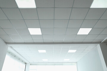 White ceiling in office room. Interior design