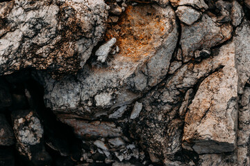 Mining process. Rocks for mining. Big gray limestone.