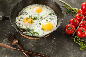 scrambled eggs for breakfast. fried eggs in a pan. traditional European and Slavic breakfast.