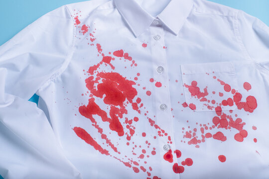 splashes of blood on white clothes. concept stain removal