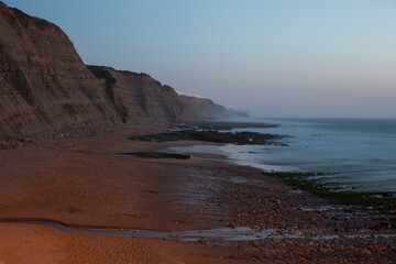View on Praia Da Magoito at sunset