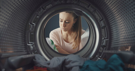 Woman finds stained clothes in the washing machine