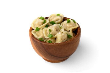 Meat dumplings in wooden bowl with green onion isolated on white background.