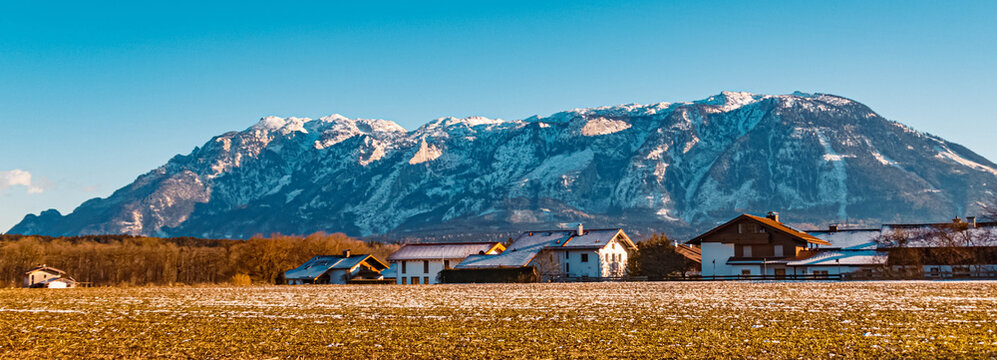 Beautiful winter landscape near Piding, Berchtesgaden, Bavaria, Germany with the famous Untersberg and Hochthron summits in the background