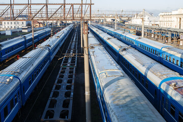Fototapeta na wymiar Cargo freight station with many passenger trains
