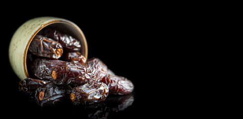 Dates fruit and rosary still life against on white background. Ramadan background greeting card. Ramadan Kareem.