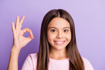 Photo of young girl happy positive smile show okey sign perfect cool ad promo advise choice...