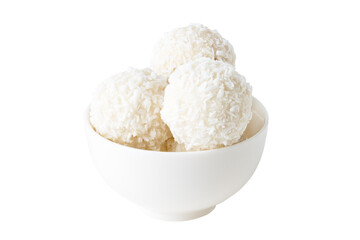 coconut candies in white cup isolated on white background