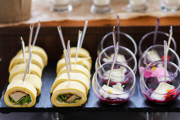 Catering service. Snacks for guests on the table.