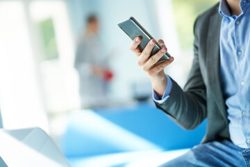 Adult businessman using computer in playroom relax zone
