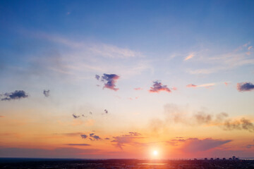 panorama of a bright dramatic twilight sky, beautiful clouds at dawn