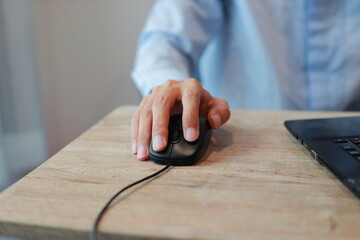 man using computer mouse