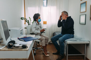 Doctor and patient during examination in office