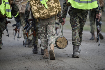 Special forces military training. Photograph detail with military equipment and assault rifle.