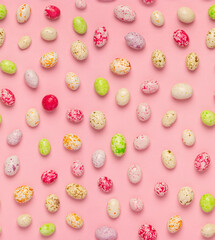 Seamless pattern from tasty sweets on a pink background. Pattern for wrapping paper or festive background. Candies background.