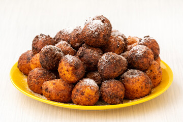 Small balls of freshly baked homemade cottage cheese doughnuts