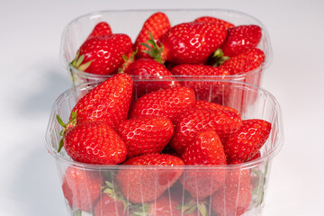 Punnet of strawberries isolated on white background, High quality photo