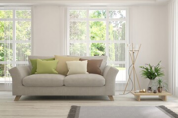 White living room with sofa and summer landscape in window. Scandinavian interior design. 3D illustration