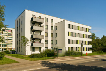 Fototapeta na wymiar Apartment building in a prefabricated housing estate on the street