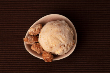 Roasted almond ice cream from above with roasted almonds