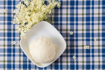 scoop of homemade elderflower ice cream from above