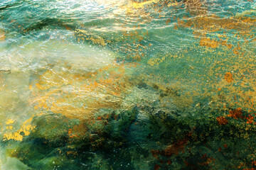 Fototapeta na wymiar abstract background of waves of water creating swirls and ripples