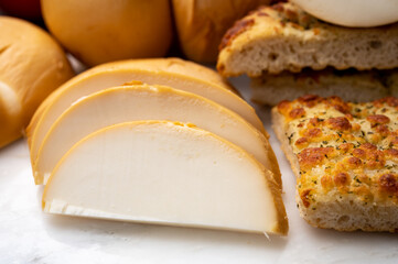 Cheese collection, Italian yellow smoked caciocavallo or scamorza cheese