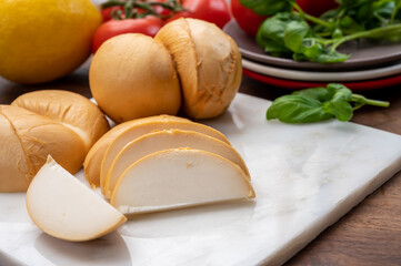 Cheese collection, Italian yellow smoked caciocavallo or scamorza cheese