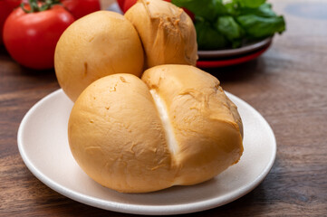 Cheese collection, Italian yellow smoked caciocavallo or scamorza cheese