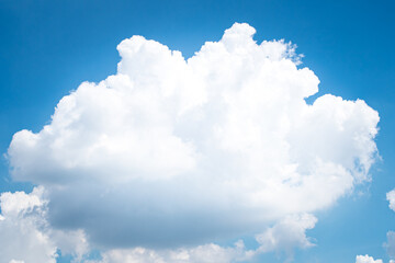 Large singleCumulonimbus clouds. cumulus cloud. Puffy or cotton like or fluffy cloud blue sky white...
