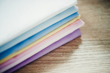 multicolored fabric samples on a light background close-up