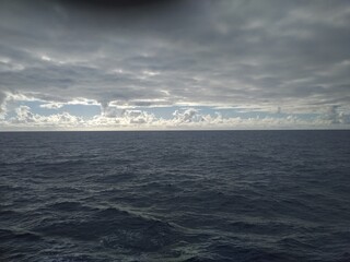 Fototapeta premium Atlantic Ocean, raging waves, thick clouds.