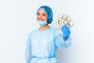 Young mixed race doctor woman holding dollars isolated on white background