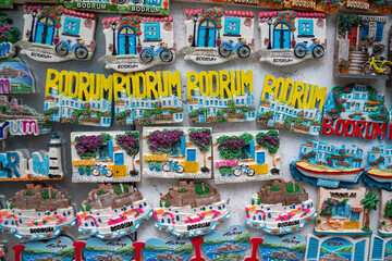 Turkey, Bodrum.Ceramic greek mill souvenirs on the shop window.
