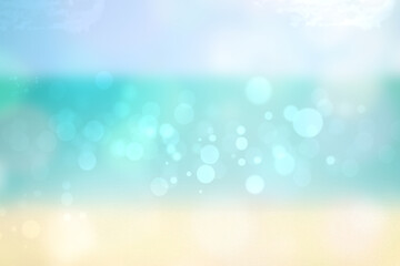 Abstract sea background. Abstract tropical sandy summer beach background with bokeh lights on light blue sky and sun. Beautiful texture. Space.