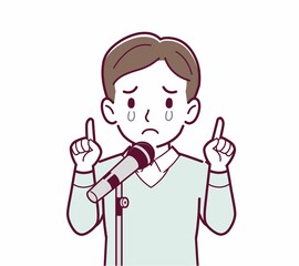 マイクで話す人