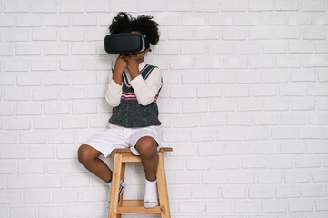 Copy space happy black people African American child play VR at home 