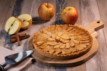 Delicious apple pie on a wooden table, from above. High quality photo