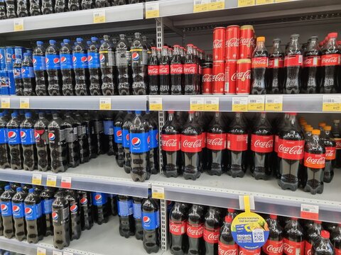 Carbonated drinks on supermarket shelves