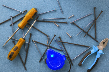 Men's work. The repair tools are on the table. The concept of housework, workshop.
