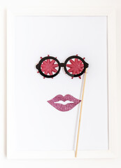 Beautiful anthropomorphic mermaid face, with starfish eyes in fake glasses in a white frame.