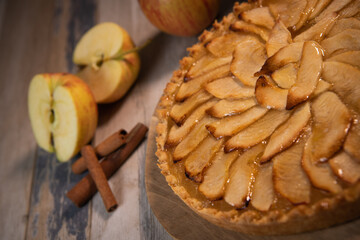 Delicious apple pie on a wooden table, from above. High quality photo