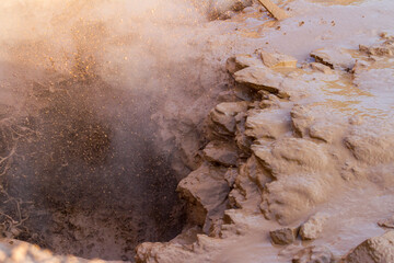 Steaming, sulfuric, active fumaroles near Pauzhetskaya Geothermal Power Plant, Kamchatka Peninsula,...