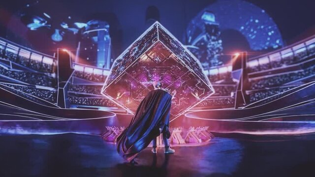 Abstract arena lit up by neon light with an energy giant 3D cube in the middle and a superhero with a fluttering cloak. Stock footage. Beginning of the fight or the show and people with superpowers.