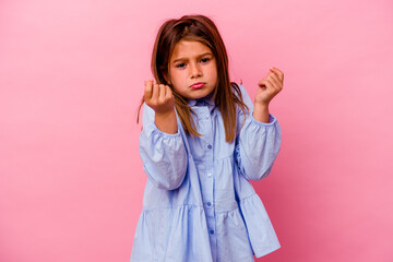 Little caucasian girl isolated on pink background  showing that she has no money.